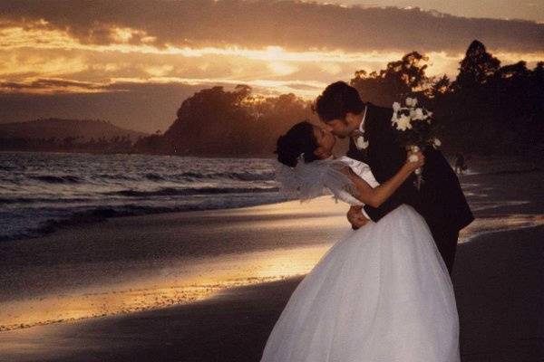 Romantic sunset kiss