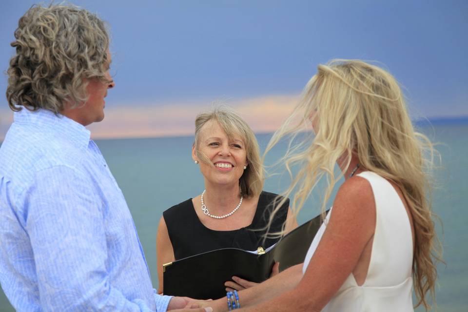 Officiant happy for the newlyweds