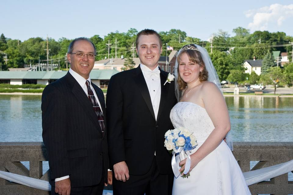 Rev. Thomas J Perrucci with a couple