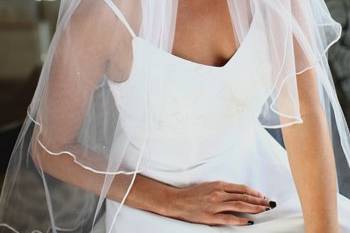 Our 2-tier Fingertip veil comes with custom edge and fascinator. Available for customizing in our illusion veil area.