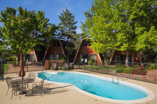 Guests will enjoy relaxing in the outdoor pool and hot tubs.