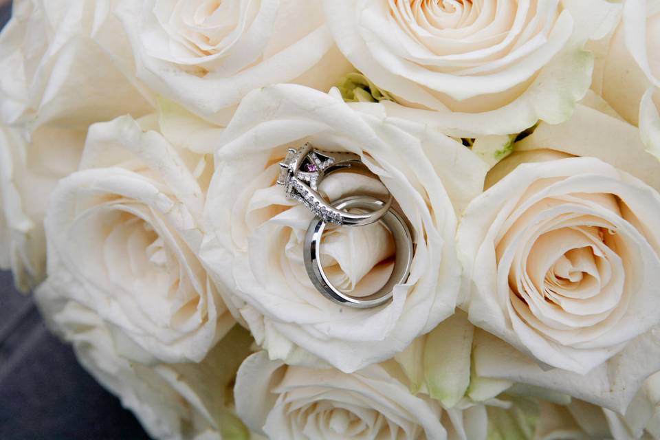 Wedding Rings in rose bouquet