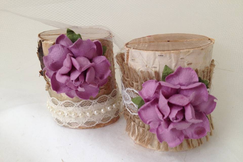 A lovely lilac country garden! These are so pretty on the table and they do a fantastic job bringing out the flower colors in your centerpiece.This listing is for a set of 10 natural birch wood place card holders for $35.00Each birch wood holder is embellished with burlap and lace or pearls and lace ribbons. They are a beautiful compliment to the decorations on your tables. They are 2 inches tall, and approximately 2 - 2 1/2 inches wide. The flowers are 1 1/2 inch wide. Each holder has a 3/8 inch slot on the top which holds the place card nicely. Use these at weddings, baby showers, and really any party event that you want some additional sparkle to your table. Mixing and matching styles is a beautiful table design statement.if you don't see what you are looking for, just send us a message and we are happy to create that special look for you.Keep it rustic chic!Tutti Rose DesignsBe sure to visit www.etsy.com/shop/tuttirosedesigns to see our entire collection