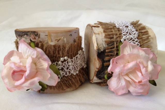 Such a soft pink beautiful place card holder. A beautiful bridal look. Perfect for a rustic barn wedding. They are so pretty on the table and they do a fantastic job bringing out the flower colors in your centerpiece.This listing is for a set of 10 natural birch wood place card holders for $35.00Each birch wood holder is embellished with a 2 inch soft pink rose with burlap and pearl lace ribbon. They are a beautiful compliment to the decorations on your tables. They are 2 inches tall, and approximately 2 - 2 1/2 inches wide. Each holder has a 3/8 inch slot on the top which holds the place card nicely. Use these at weddings, rehearsal dinners, baby showers, and really any party event that you want some additional sparkle to your table. if you don't see what you are looking for, just send us a message and we are happy to create that special look for you.Keep it rustic chic!Tutti Rose DesignsBe sure to visit www.etsy.com/shop/tuttirosedesigns