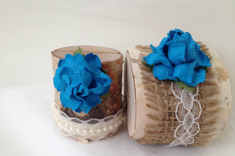For people who love blue - this is for you. So vibrant! This is a statement for your table.This listing is for a set of 10 natural birch wood place card holders for $35.00Each birch wood holder is embellished with burlap and lace or pearls and lace ribbons. They are a beautiful compliment to the decorations on your tables. They are 2 inches tall, and approximately 2 - 2 1/2 inches wide. The flowers are 1 1/2 inch wide. Each holder has a 3/8 inch slot on the top which holds the place card nicely. Each piece is hand crafted so no two are alike!Use these at weddings, baby showers, and really any party event that you want some additional sparkle to your table. Mixing and matching styles is a beautiful table design statement.if you don't see what you are looking for, just send us a message and we are happy to create that special look for you.Keep it rustic chic!Tutti Rose DesignsBe sure to visit www.etsy.com/shop/tuttirosedesigns to see our entire collection.