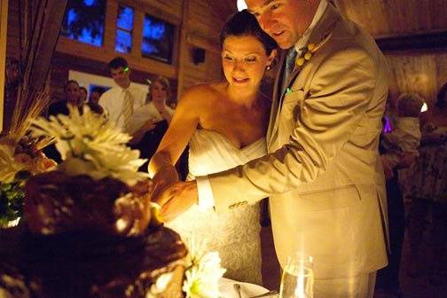 E & M cut their cake. Fireseed Gardens, September 4, 2010. Photo by Libby Lewis.