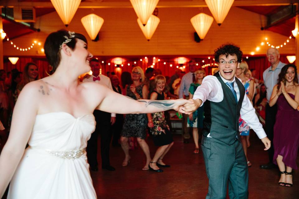 Conga line at E & M's Wedding, Fireseed Gardens, Whidbey Island, September 4, 2010. Photo by Libby Lewis.