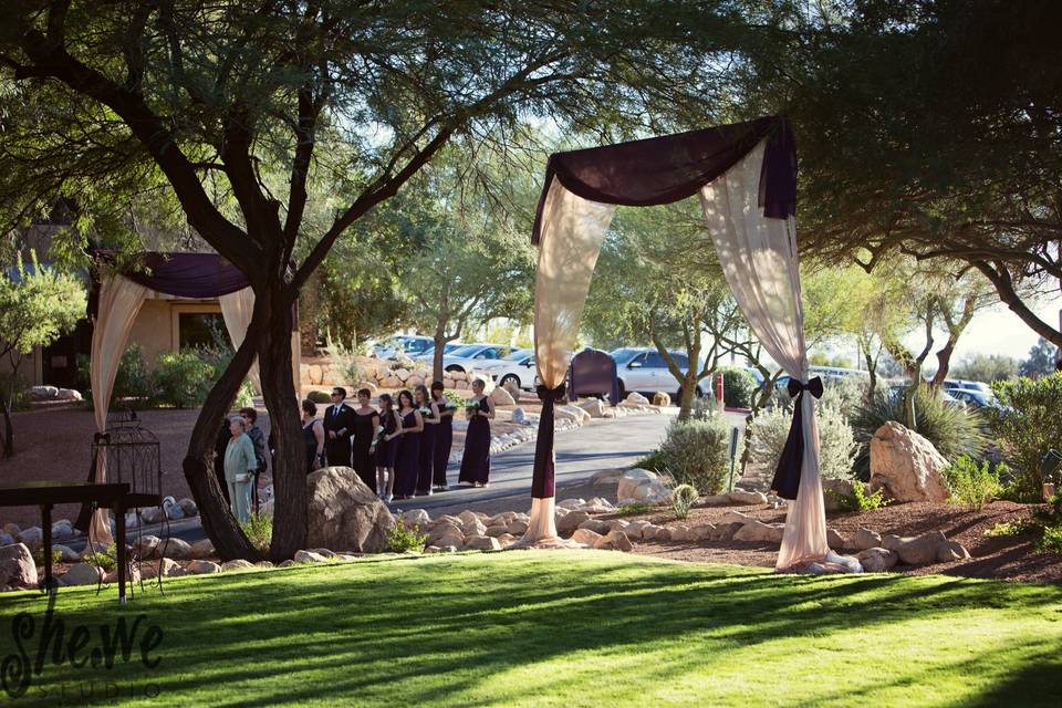 Amanda wanted to make sure that the beautiful desert view was the focal point of the ceremony site. So we played up the walkway to the ceremony table. The guests walked through the curtains to make them a part of the experience.