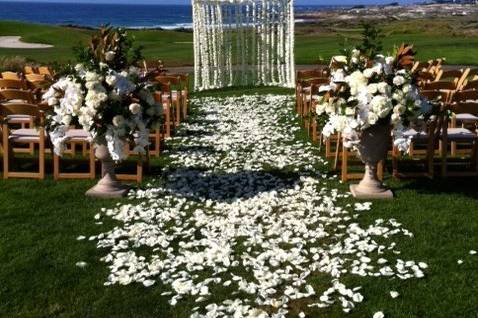 Wedding Ceremony at The Inn at Spanish Bay.  The canopy was copied from an idea in Martha Stewart Weddings and recreated by the Pebble Beach floral and event design team.