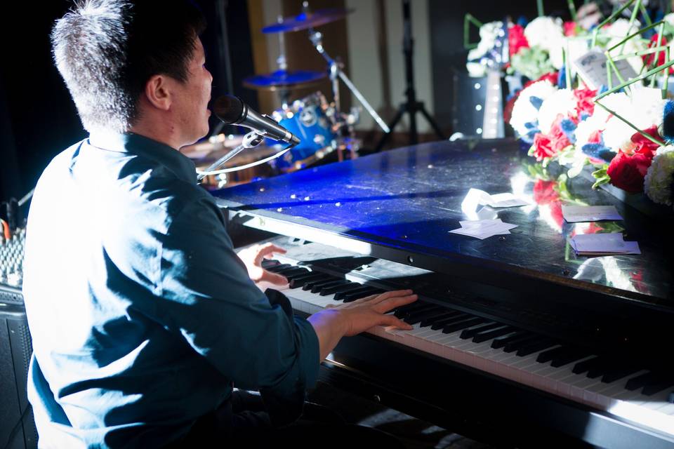 Singing while playing the piano