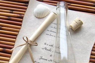 Although it is quite beautiful, the Beachcomber Message in a Bottle ® invitation will surely tempt your guests with the promise of a casual affair and a fun time.
Invitation Service Includes
11 inch tall non-screw top glass bottles
FREE assembly of everything
FREE Extra Page for travel/directions information
FREE gloss white Presentation Box
FREE physical proof mailed to you with every order