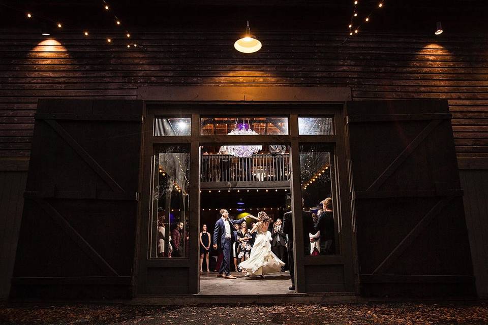 Dancing in the carriage barn at The Roxbury Barn and Estate. Photo by Todd Laffler.