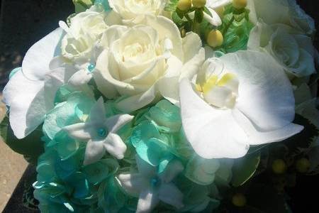 Aqua blue, phaelonopsis orchid, stephanotis