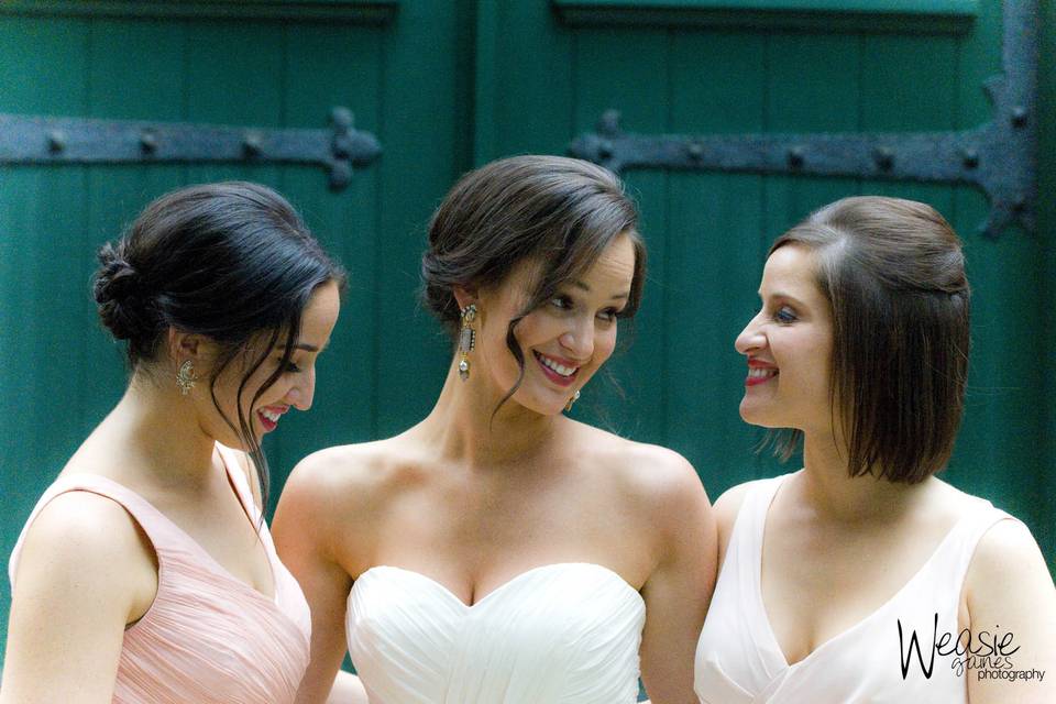 Updos of the bride and bridesmaids