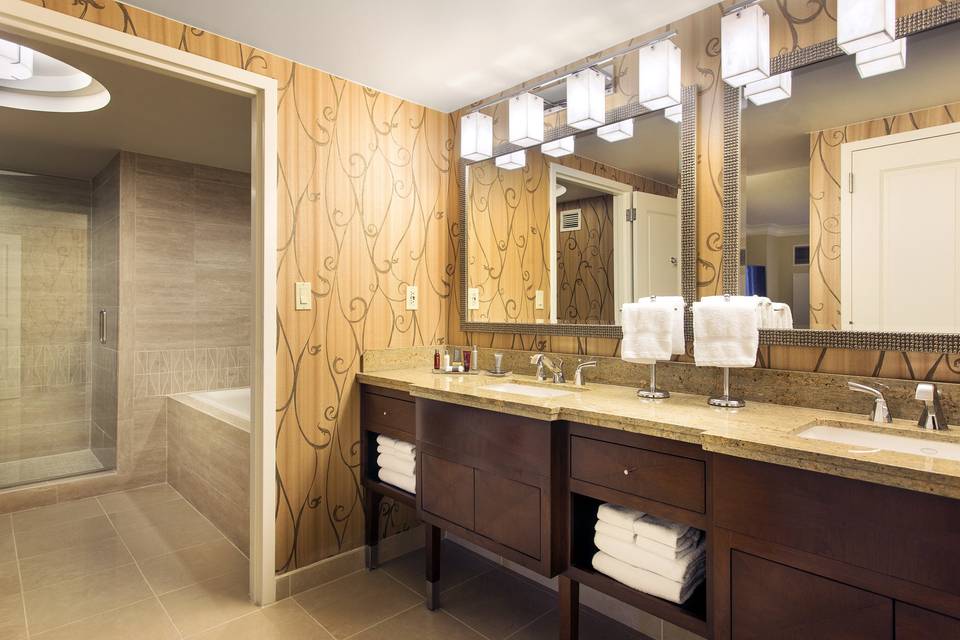 Our presidential suite offers an expansive bathroom, perfect for getting ready with your best friends.