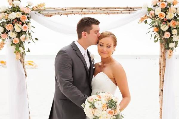 Newlyweds under arch