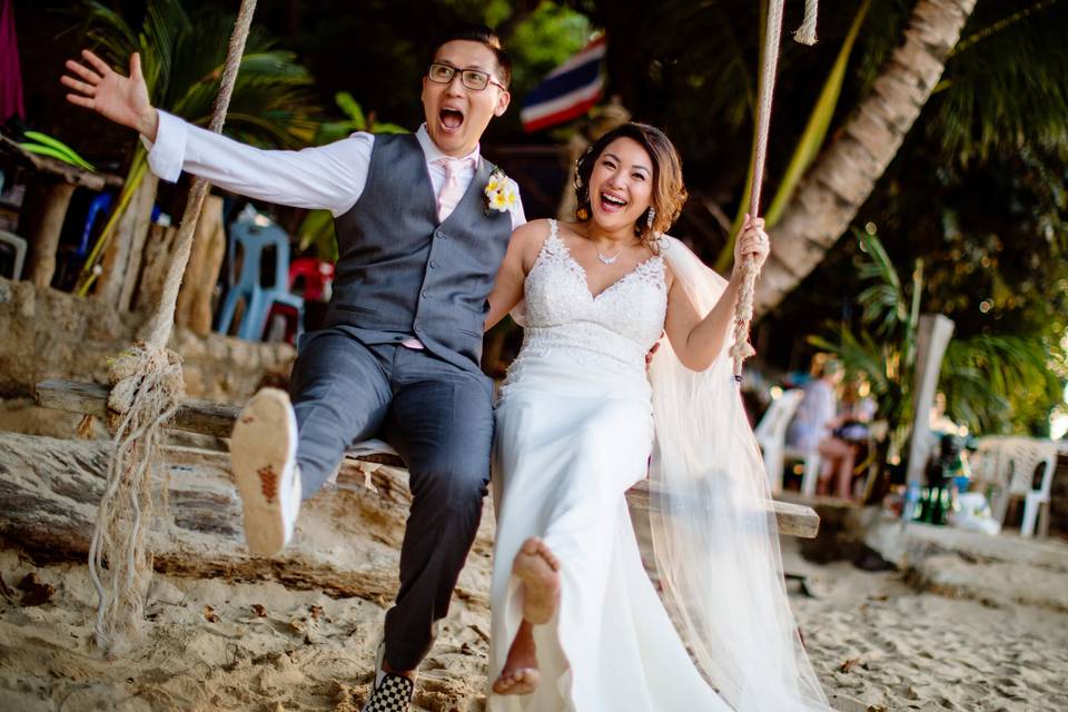 Couple on swing in Thailand