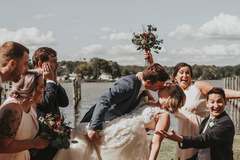 Groom kissing his bride