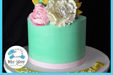 Aqua buttercream wedding cake with peony & cabbage roses.
