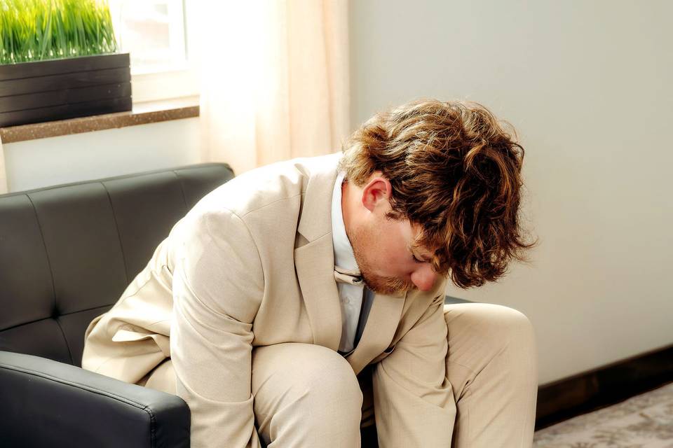 Groom prep moments before the
