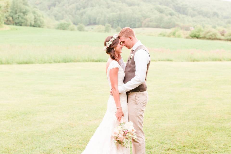 Groom kissing his bride