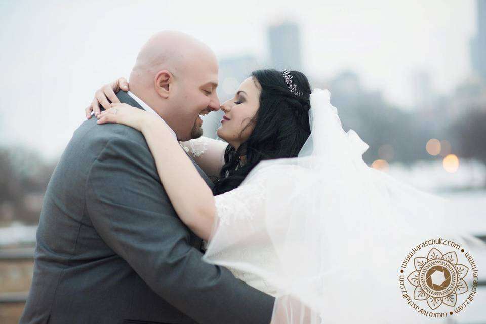 Newlyweds about to kiss