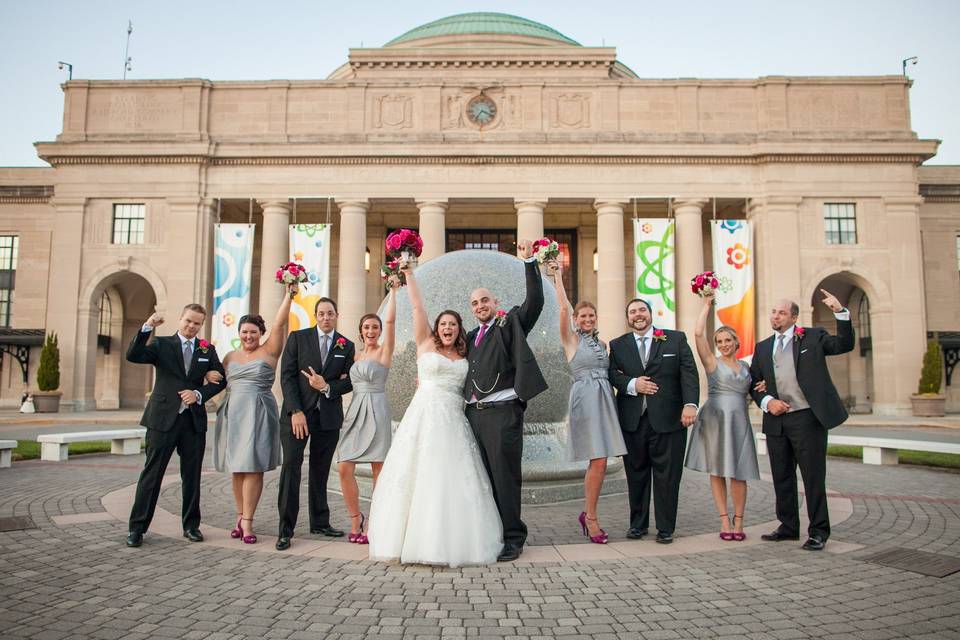 The couple with the bridesmaids and groomsmen