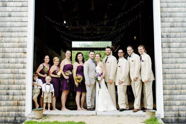 The couple with the bridesmaids and groomsmen