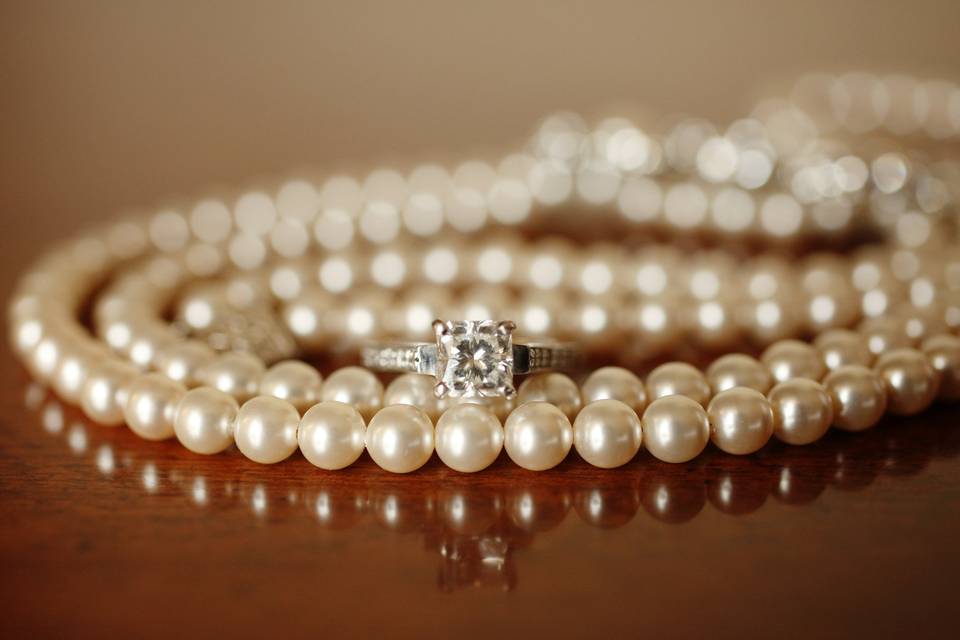 Wedding ring on a pearl necklace