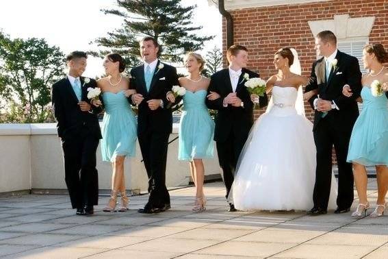 The couple with the bridesmaids and groomsmen