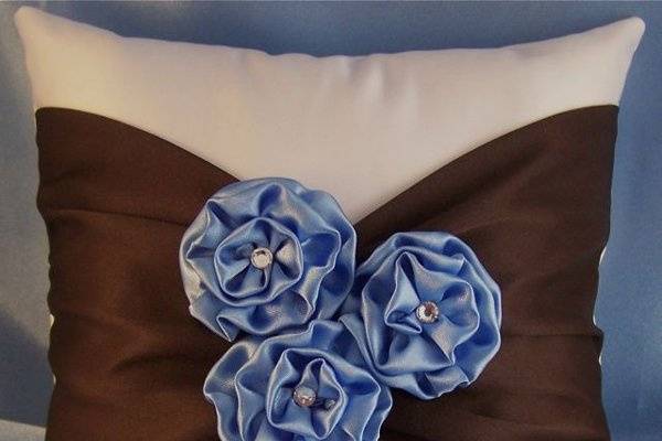 Satin ring bearer pillow with three hand made satin flowers accented with a Swarovski rhinestone