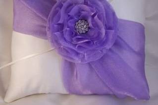 Lovely in lavender!  Satin ring pillow with corner to corner gathered organza and center hand made organza flower with rhinestone button.