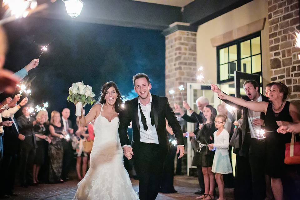 Newlywed couple sparkler exit