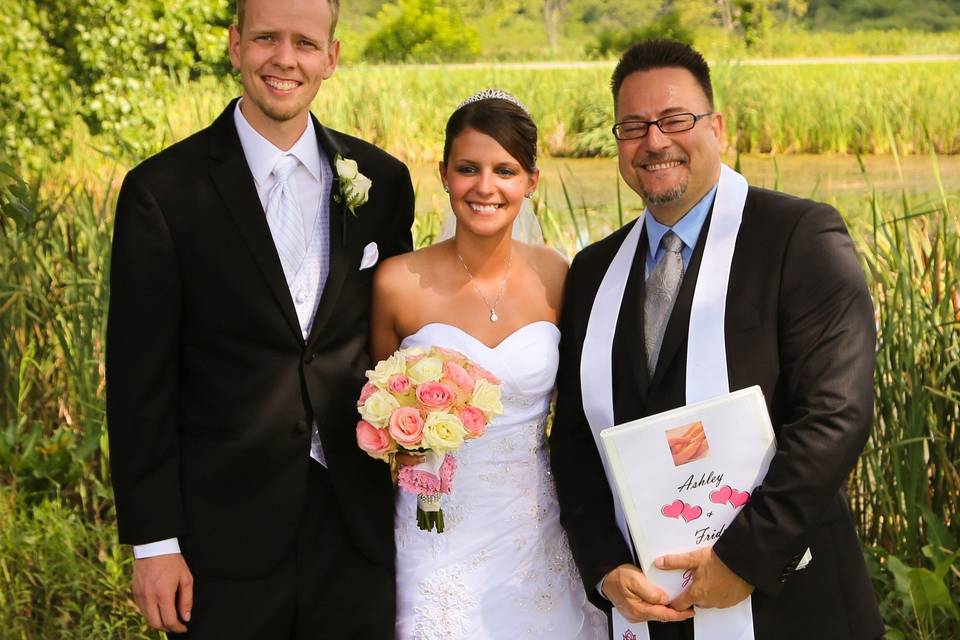 Newlyweds and the officiant