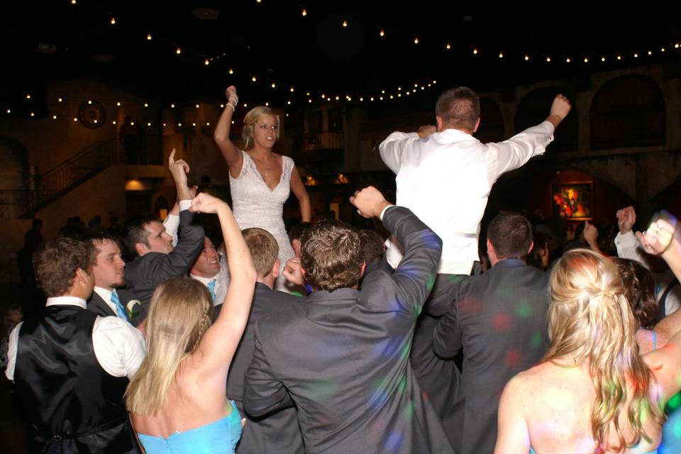 Bride and Groom crowd surfing