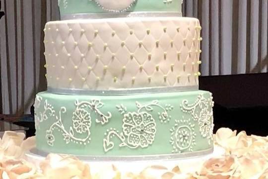 Five tier white and blue cake