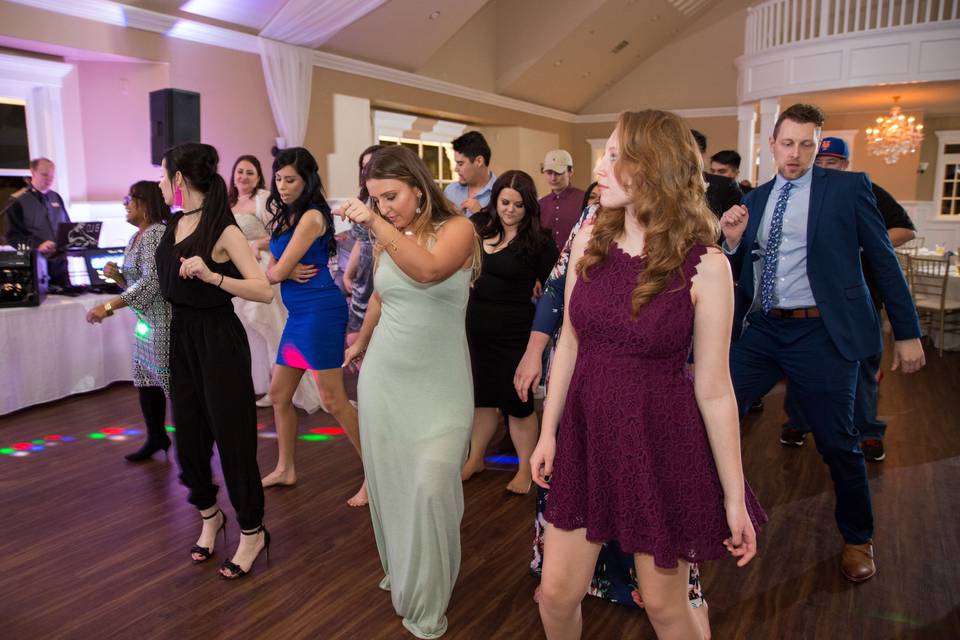 Guests doing a group dance