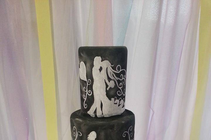 Hand painted story line on Chalk board inspired cake
