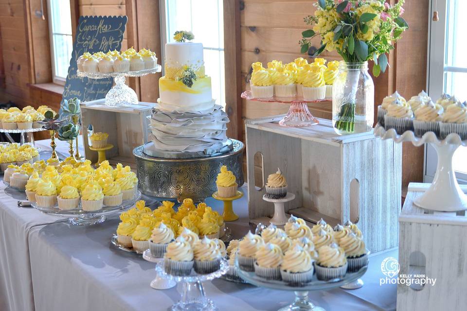 Wedding cake and cupcakes