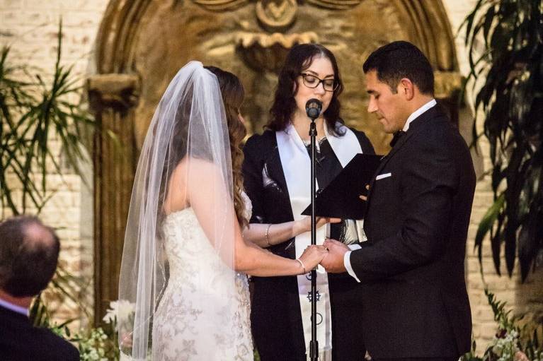 Exchanging the rings - Photo by Michelle Flores