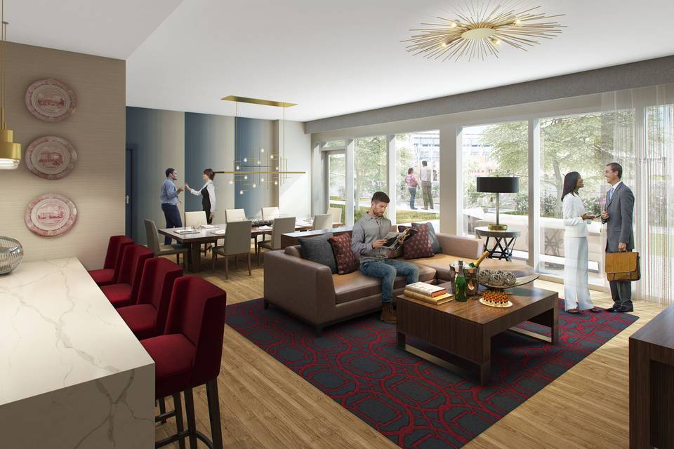 Hospitality suites available with outdoor patio overlooking views of Kyle Field