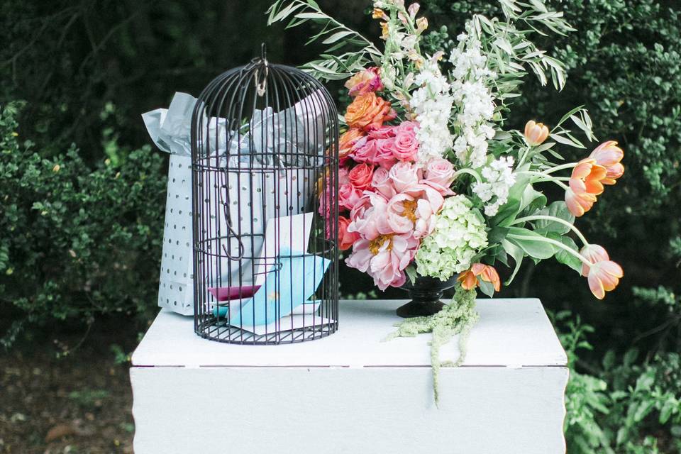 Birdcage and flowers