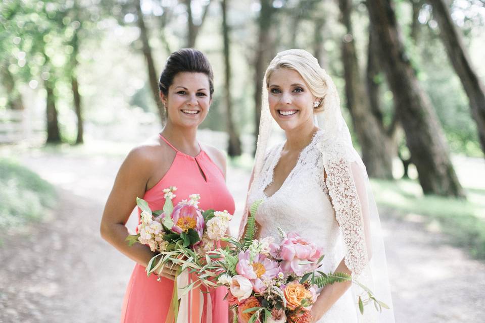 Bridesmaid and bride