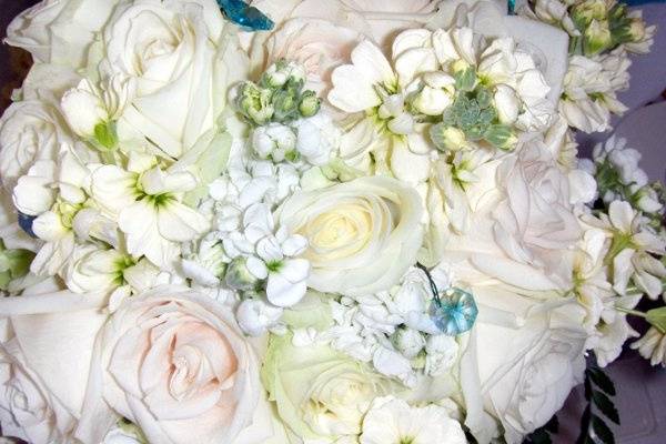 Ivory and white flowers with pool blue gems