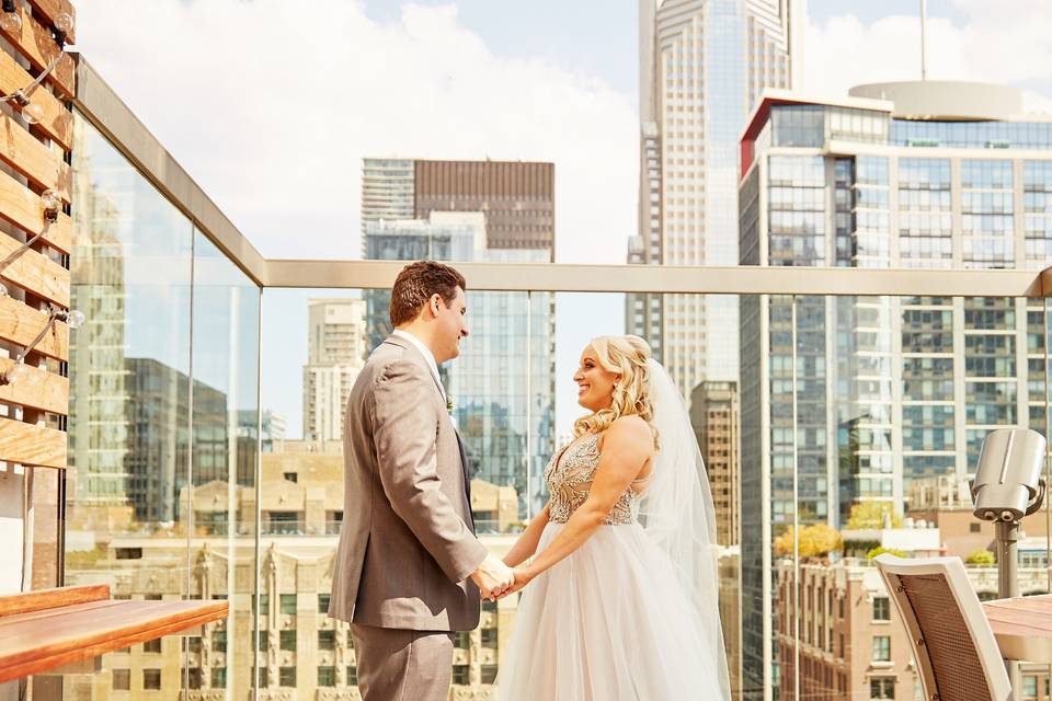 Couple in front of skyscrapers