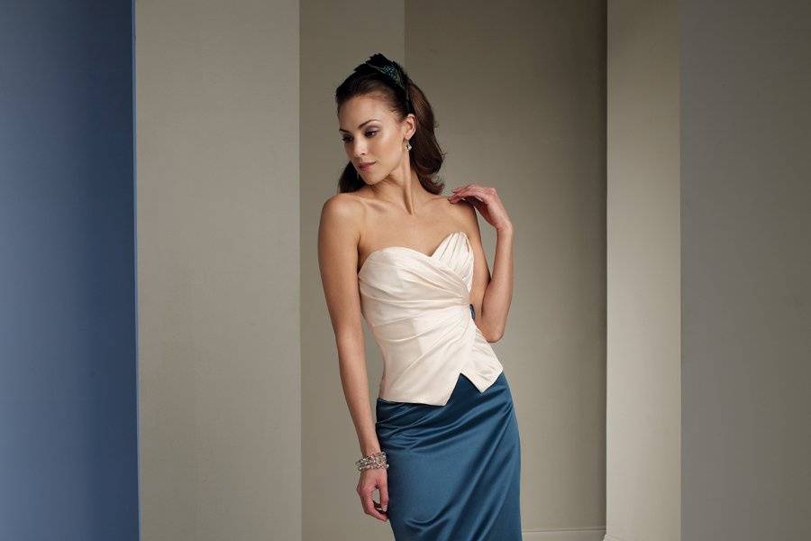 Style No. BY21102
Strapless crepe back satin A-line gown with softly curved neckline, wide ruched asymmetrically dropped waistband with side flower accents, dipped back bodice with corset, center back gore inset with matching flowers. Removable straps included. Color Shown: Ruby. Available in all crepe back satin colors.