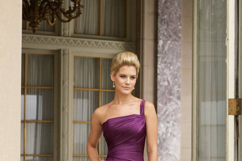 BY11020T
Strapless tea length satin sheath with side draping, asymmetrical pleated bodice, center back slit and corset back. Matching shawl and removable straps included. Available in full length as BY11020. Available in all satin colors.