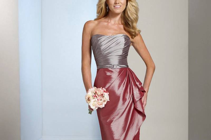 BY11230T
Strapless taffeta knee-length sheath with softly curved neckline, asymmetrically ruched bodice features a thin waistband with jeweled buckle, faux wrap side draped skirt with cascading ruffle and back slit. Removable straps included. Available in all taffeta colors.