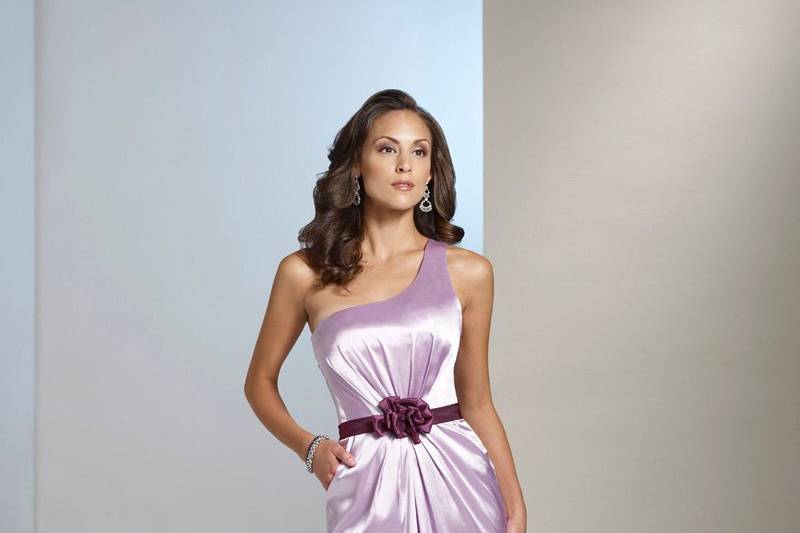 BY11241
Strapless crepe back satin gown with sweetheart neckline, directionally ruched bodice with inverted Empire waistband and center crystal accents, corset back, softly draped skirt. Removable straps included.  Available in all crepe back satin colors.