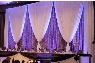 Our crystal backdrops and uplighting will add instant glamour to your big day!